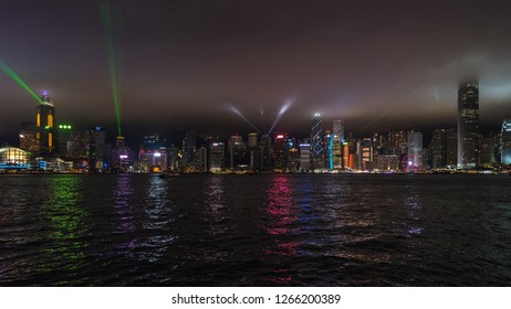 Wide Night Panorama Of Hong Kong Skyline During Symphony Of Lights, A Show Featuring, Lights, LED, Lasers And Sounds Displayed Every Night At 8 Pm. Hong Kong, January 2018