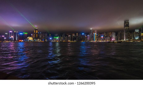 Wide Night Panorama Of Hong Kong Skyline During Symphony Of Lights, A Show Featuring, Lights, LED, Lasers And Sounds Displayed Every Night At 8 Pm. Hong Kong, January 2018