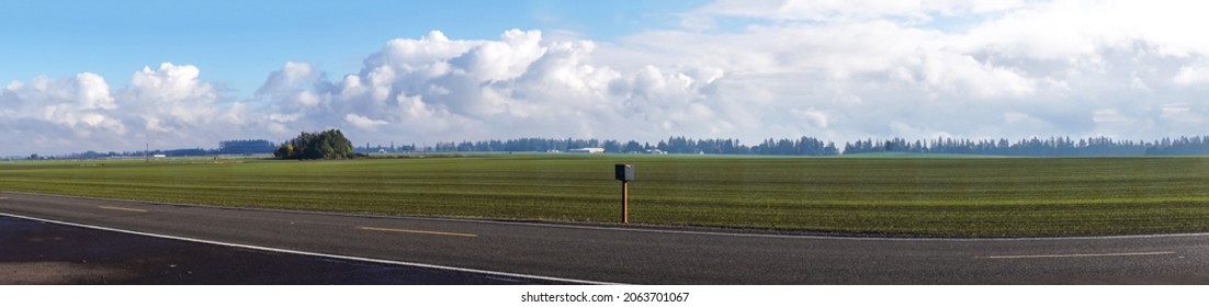 Wide Open Field With A Stand-Alone Mailbox