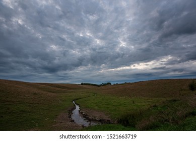 Wide Open Plains With Dramatic Clouds