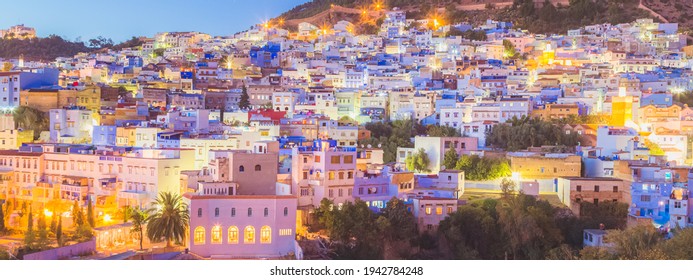 Wide, Panorama Detail Of Colourful, Vibrant Cityscape Banner View Of The Illuminated Village And Old Town Medina Of Chefchaouen, Morocco.