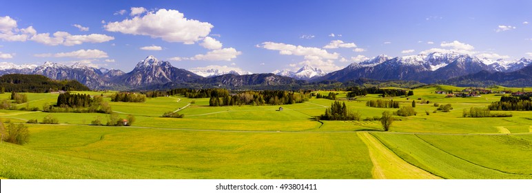 Wide Panorama Landscape In Bavaria With Alps Mountains 