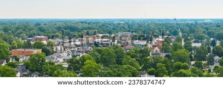Wide panoramic view of downtown Auburn with Dekalb County Court House in back aerial