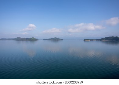 Wide Panoramic View At Summer Calm Lake In Eastern China With Very Small Island