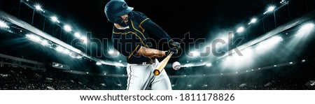 Wide photo. Porfessional baseball player with ball on grand arena. Ballplayer on stadium in action.