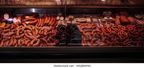 Wide Photography Of Butcher Shop And Its Fridged Counter With Meat