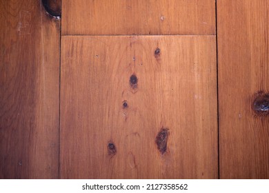 Wide Plank Pine Wood Floor With Dark Knots.