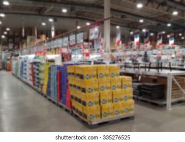 Wide Range Of Goods Displayed In A Wholesale Hyper Market, Blurred