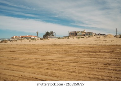 Wide Sandy Beach And Hotels With Ocean View In Small Beach Town