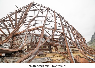 Wide Shot Of An Air Force Airplane Hanger In Dismay 