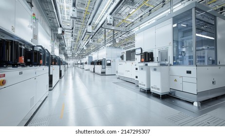 Wide shot of Bright Advanced Semiconductor Production Fab Cleanroom with Working Overhead Wafer Transfer System 