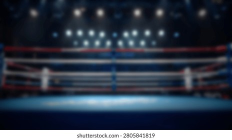 A wide shot of an empty boxing ring with red and blue ropes illuminated by overhead stadium lights in a dark arena.