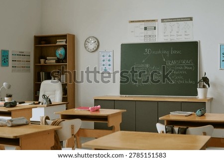 Wide shot of empty classroom displaying chalkboard lesson on 3D modeling basics, supporting digital education and coding curriculum