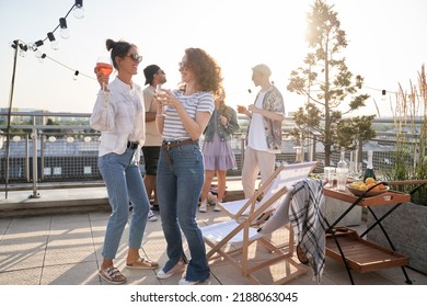Wide shot of group of friends dancing at the party  - Shutterstock ID 2188063045
