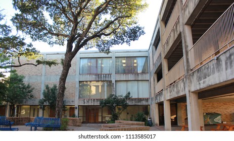 Wide Shot Of Huge College Dorm Hall With Old Stye Brick Architecture And Trees.