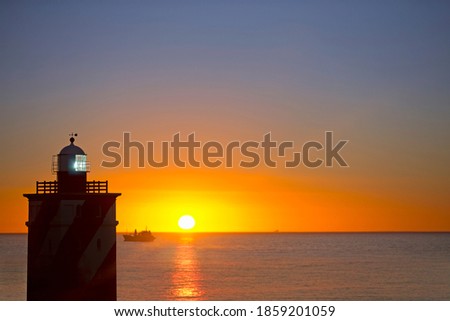 Similar – Image, Stock Photo Lighthouse with a dramatic cloudy Sunrise