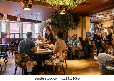 A Wide Shot Of People Dining At A Restaurant In Newcastle-upon-Tyne.