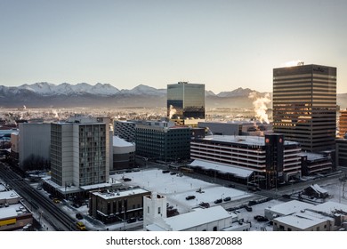 Wide shot of snowy downtown Anchorage Alaska at sunrise
