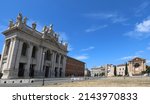 Wide square where ht Concert of May 1st takes place and the Basilica of Saint John in Laterano without people with latin text