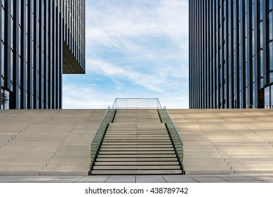 Wide stairway between two modern office buildings at the Medienhafen (media harbour) in Dusseldorf, Germany.