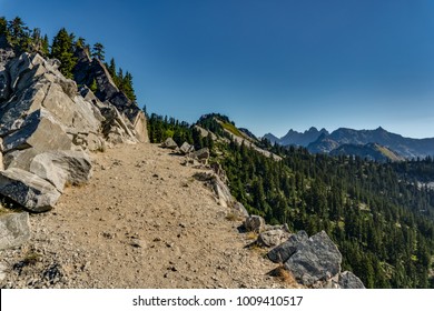 Wide trail along the edge of a cliff along the Pacific Crest Trail in Washington State