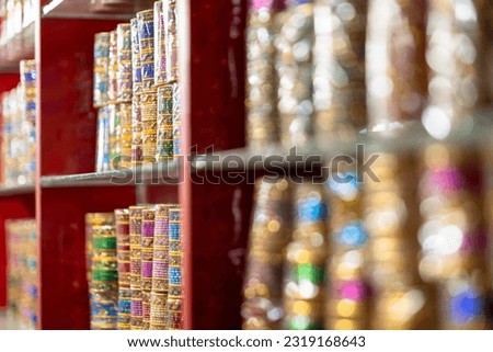 A wide variety of colorful Indian bangles are displayed