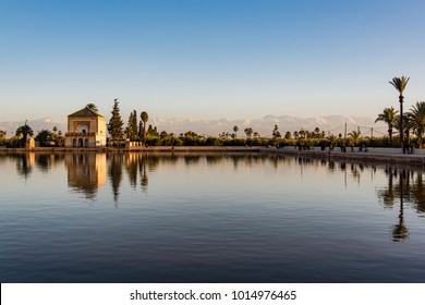 Wide View Of Menara Gardens And Atlas Mountains In Marrakech,Morocco.