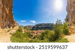 Wide view of Orbaneja del Castillo, a beautiful Spanish town known for its waterfalls in Burgos Province