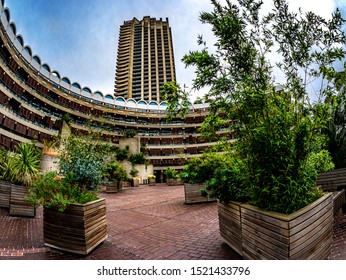 Wide View Of A Public Garden And Shakespeare Tower Residents In Barbican Estate Center, In London