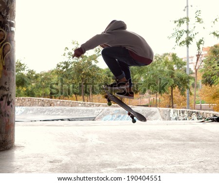 Similar – Junge Person mit Skateboard im Skatepark