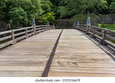 A Wide Wooden Bridge Over The Moat Of Hikone Castle