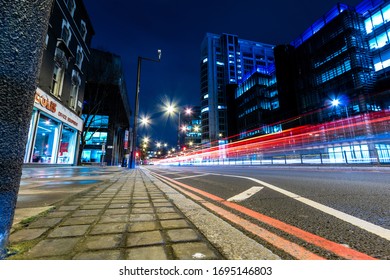 Wide-angle London Street With Traffic At Night