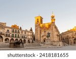 Wide-angle view of the beautiful Renaissance Plaza Mayor square in Trujillo, Extremadura, with prominent examples of architecture of the 15th and 16th centuries. Incidental people.