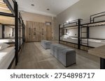 Wide-angle view of a modern hostel dormitory featuring black metal bunk beds with individual reading lights. The room includes a large wall of wooden storage lockers, grey upholstered ottomans, and clean laminate flooring. Functional urban design.