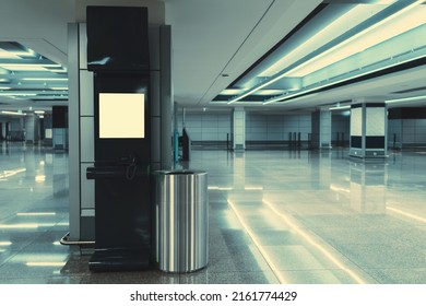 A Wide-angle View Of A Modern Opened Phone Booth With A Payphone Indoors Of A Contemporary Airport Terminal Or A Waiting Hall Of A Railway Station Depot With A Trash Can Next To The Kiosk