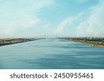 Wide-angle view of the Suez Canal offers a panoramic perspective of one of the world