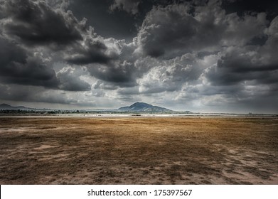 widely field, mountain and cloud in dramatic - Powered by Shutterstock