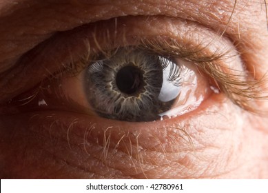 Widely Open Elderly Man's Eye Closeup