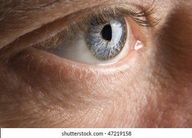 Widely Open Elderly Man's Eye Closeup