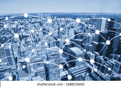 Widespread Pandemic COVID-19 Coronavirus Infection Over An Urban City Setting. Concept Of Fast Community Spread With Virus Symbol.