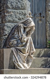 Widow Marble Statue Outside A Tomb Cemetery