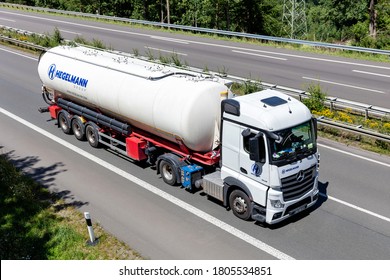 WIEHL, GERMANY - JUNE 26, 2020: Hegelmann Mercedes-Benz Actros Truck With Dry Bulk Tank Trailer On Motorway