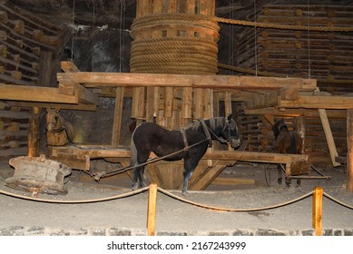 Wieliczka, Poland, June 4, 2022 - Interior Of The Wieliczka Mine, Rock Salt Mine, Museum, Wieliczka Salt Mine Museum Near Krakow, Displaying Historic Salt-mining Technology.