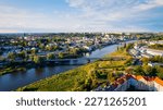 In Gorzów Wielkopolski, a drone photo was taken on a sunny day featuring the River Warta, the Cathedral, and the city center