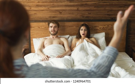 Wife catching husband with mistress in bed, cheating in marriage, divorce reason