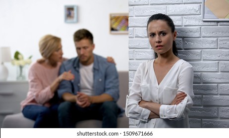 Wife feeling confusion, husband and mother-in-law discussing relationship