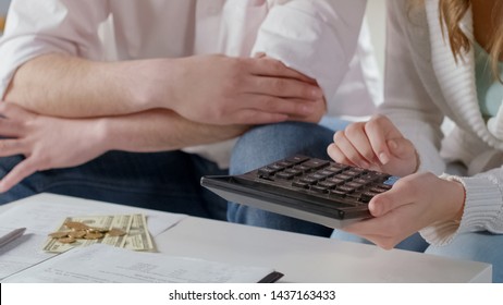 Wife And Husband Calculating Family Budget, Financial Crisis, Low Salary Closeup