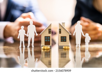 Wife And Husband Splitting Children And House During Divorce Process