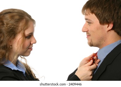 Wife, Secretary, Or Business Associate Fixing Man's Tie