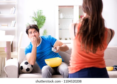 Wife Unhappy That Husband Is Watching Football